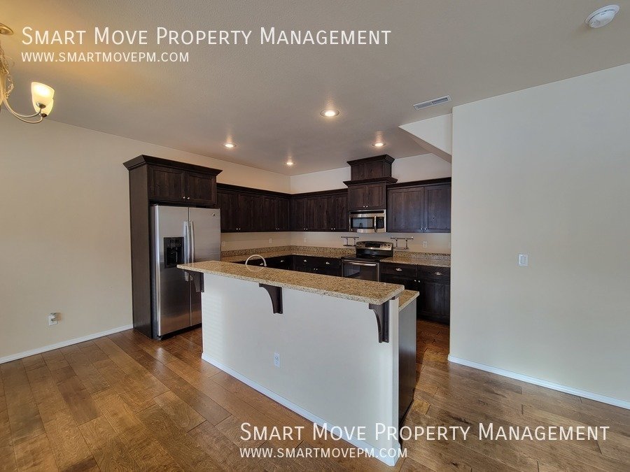 Adorable Two Story off Maple Grove. Neighborhood Pool, Park, Gym. Yard Care included property image