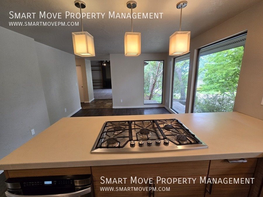 Chic & Modern Highlands Home.  3 Tiered Park-like Backyard property image