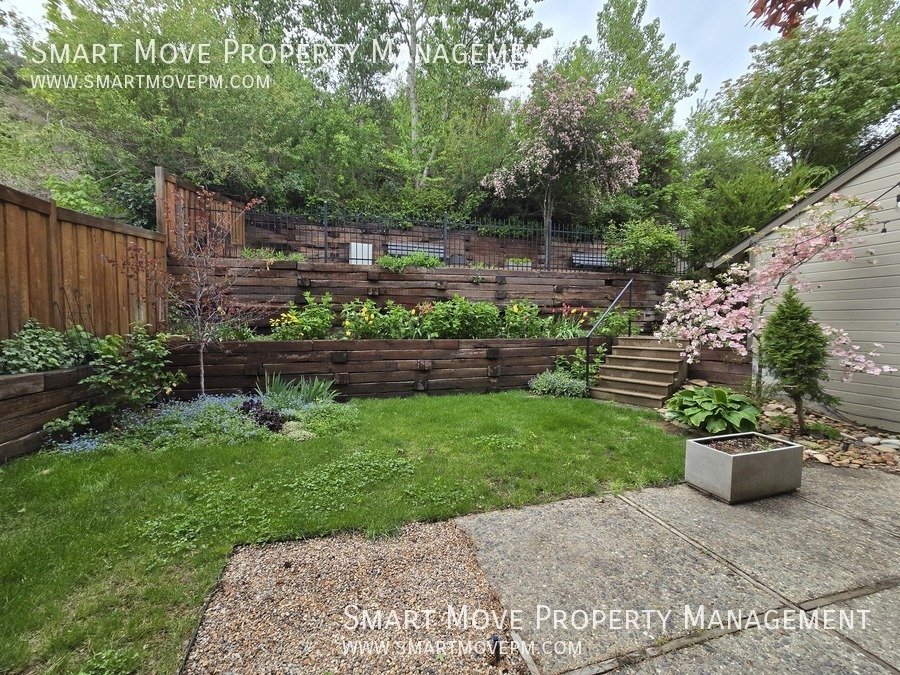 Chic & Modern Highlands Home.  3 Tiered Park-like Backyard property image