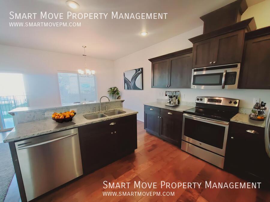 Adorable Two Story off Maple Grove. Neighborhood Pool, Park, Gym. Yard Care included property image