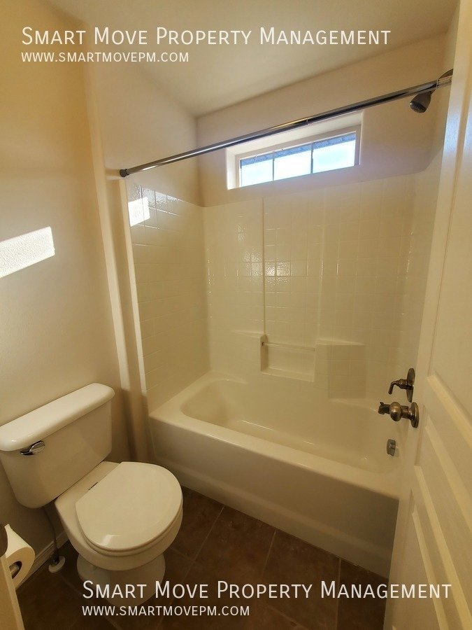 Adorable Two Story off Maple Grove. Neighborhood Pool, Park, Gym. Yard Care included property image
